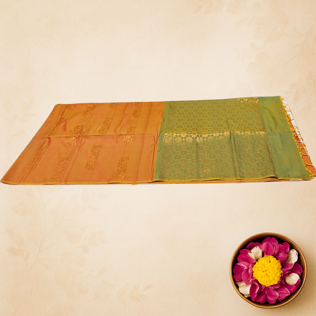 Traditional Orange & Green Handloom Silk Saree with Subtle Floral Zari Work – Festive & Temple Wear